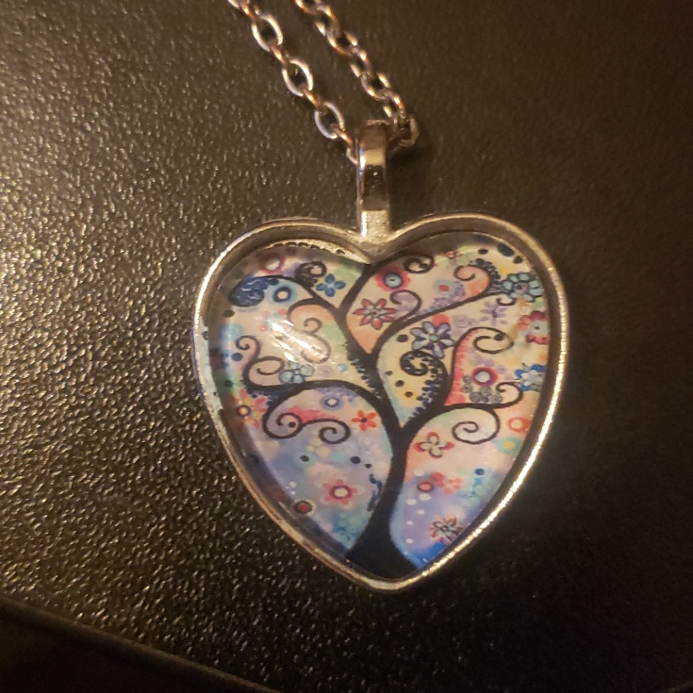 Gorgeous pastel tree of life pendant